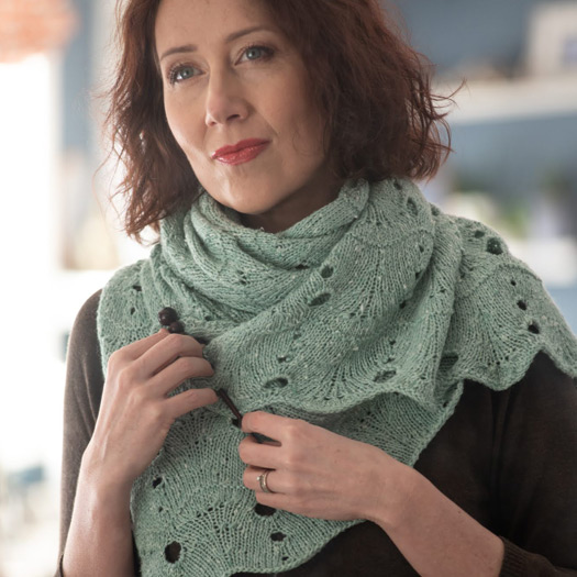 Woman wearing knitted shawl